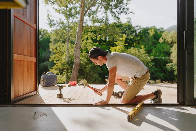 Man working on composite decking