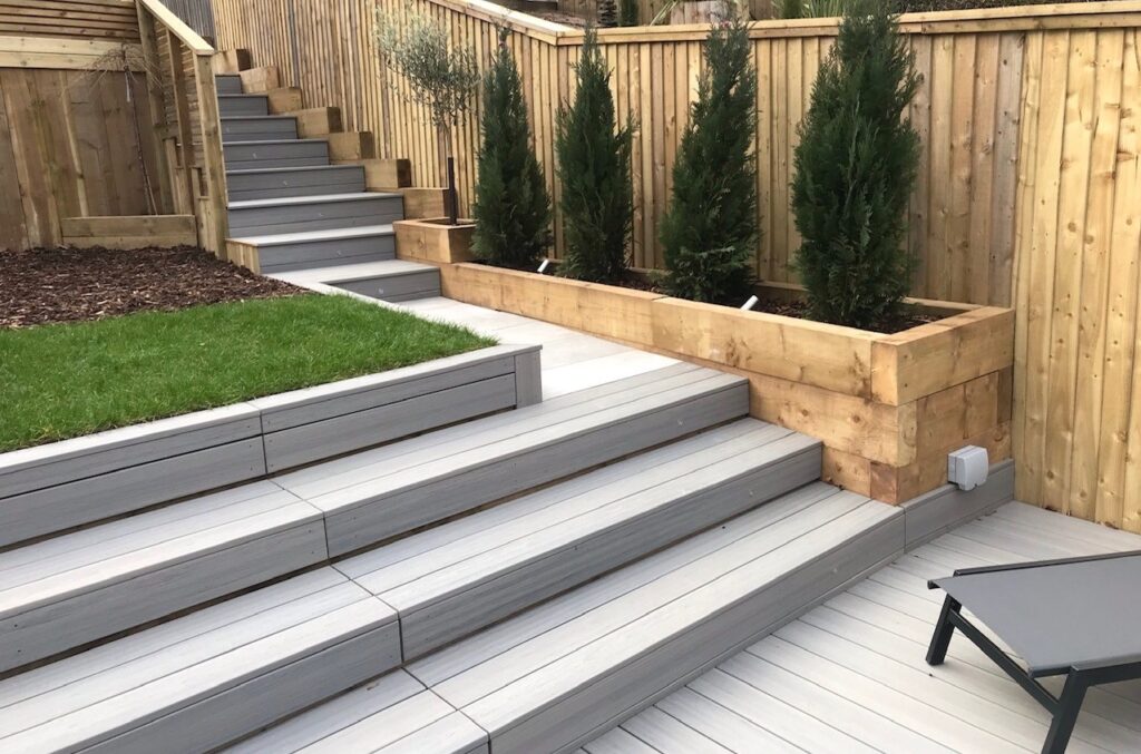 Stepped garden with light grey composite decking