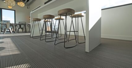 Composite decking being used in an indoor setting